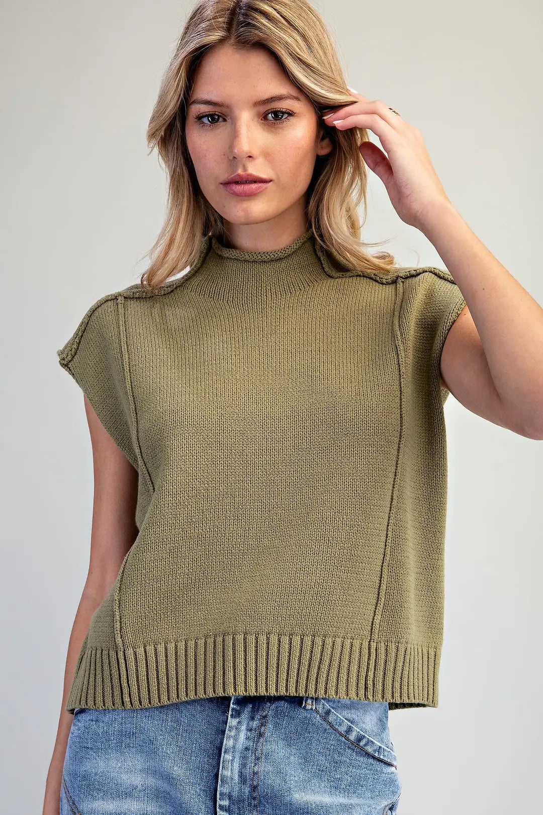 Mock Neck Exposed Seam Knit Top